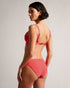 SHANEES-Swimwear-Get ready to make a splash with our SHANEES bikini bottom. With full coverage, you'll feel confident whether you're lounging poolside or taking a dip in the ocean. This versatile bottom can be mixed and matched with your favourite tops, or worn with the matching piece.The fabric of this product is made with 78% recycled polyamide. Using recycled polyamide helps divert plastic waste from ending in landfills. Bikini bottom Solid colour Full coverage Ted Baker logo hardware Matching bikini top